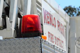 A red emergency light on a Menlo Park Fire District vehicle.A red emergency light on a Menlo Park Fire District vehicle.